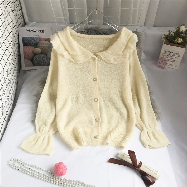 Novi model ženskog kardigana sa lotos rukavima i kragnom