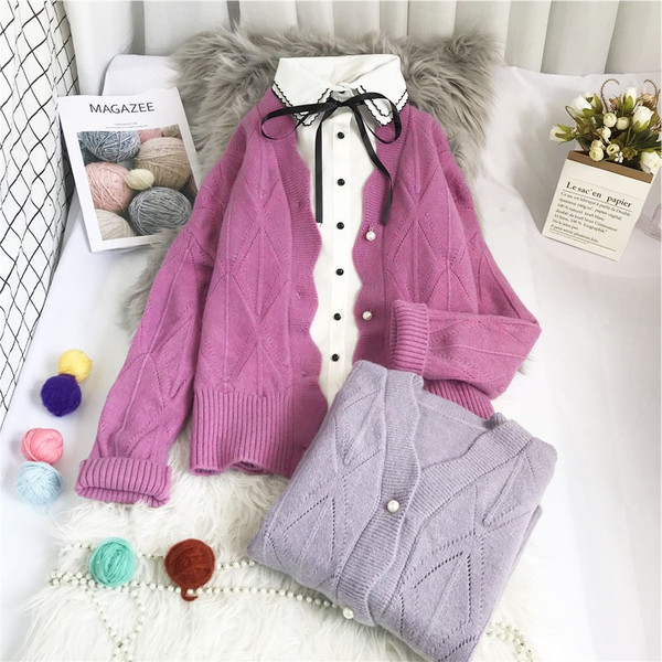 Naiste kootud vest - nööpide ja pikkade varrukatega