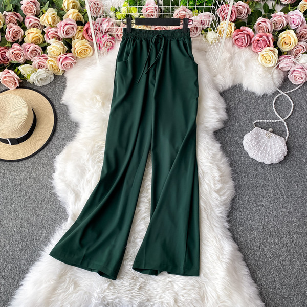 Moodsad naiste püksid elastse vöökoha ja lipsudega