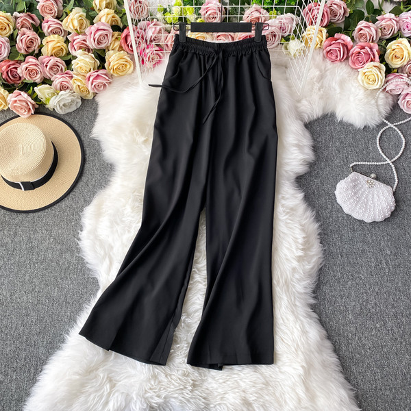 Moodsad naiste püksid elastse vöökoha ja lipsudega