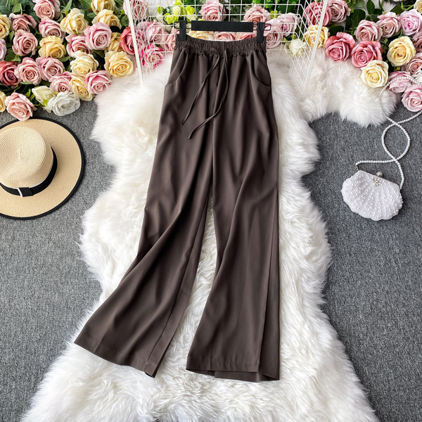 Moodsad naiste püksid elastse vöökoha ja lipsudega