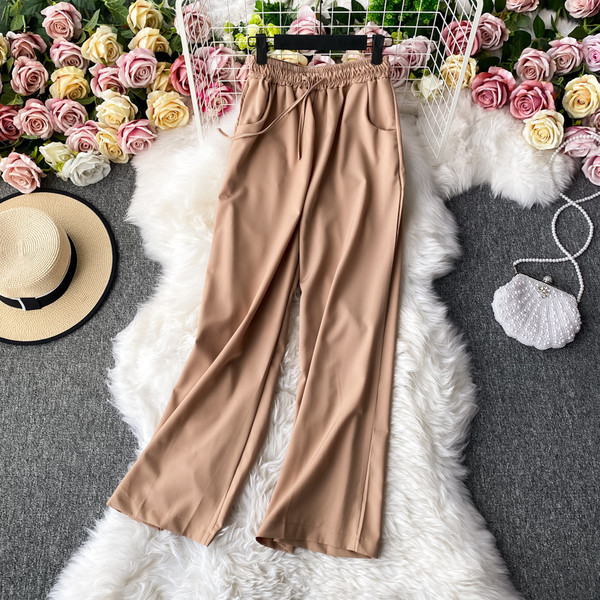 Moodsad naiste püksid elastse vöökoha ja lipsudega