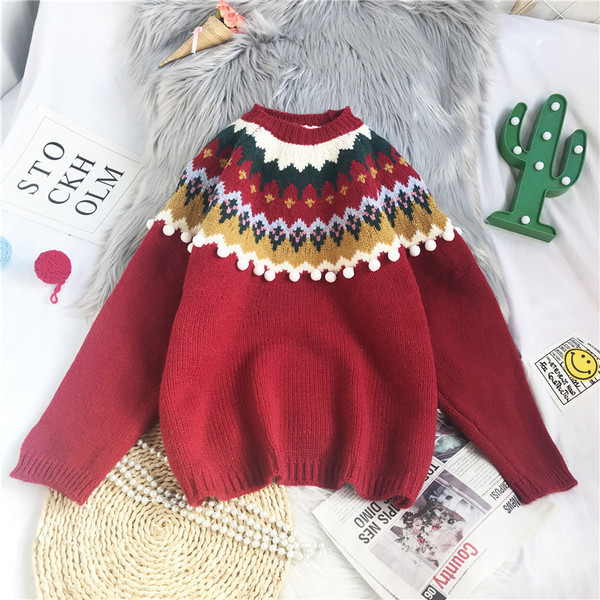 Moderan ženski pleteni pulover s okruglim izrezom i uzorkom