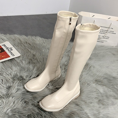 Γυναικείες μπότες από οικολογικό δέρμα με φερμουάρ και επίπεδη σόλα