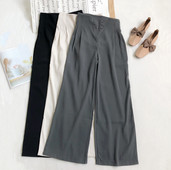 Naiste püksid kõrge vöökoha ja nööpidega lai mudel