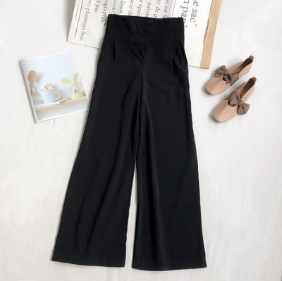 Naiste püksid kõrge vöökoha ja nööpidega lai mudel