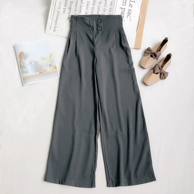 Naiste püksid kõrge vöökoha ja nööpidega lai mudel