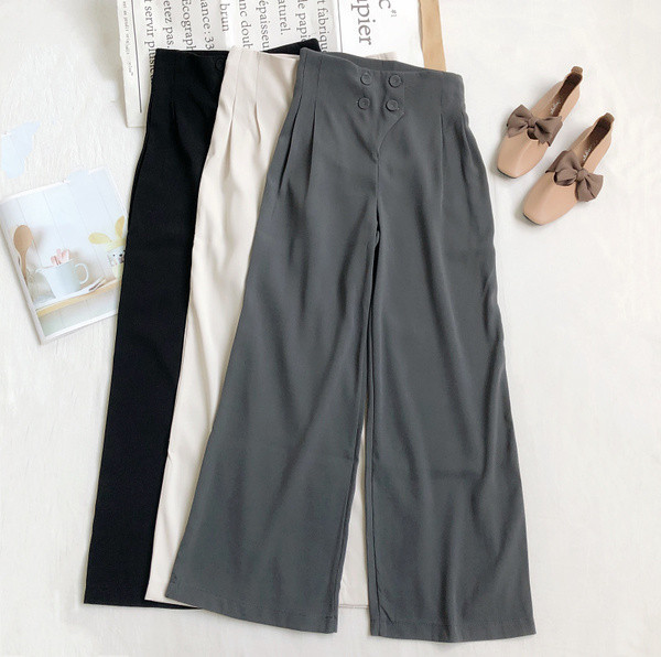 Naiste püksid kõrge vöökoha ja nööpidega lai mudel