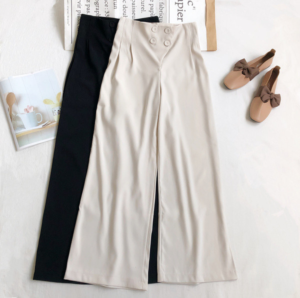 Naiste püksid kõrge vöökoha ja nööpidega lai mudel