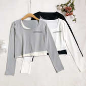 Ženska bluza s okruglim izrezom i vezom