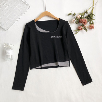 Ženska bluza s okruglim izrezom i vezom