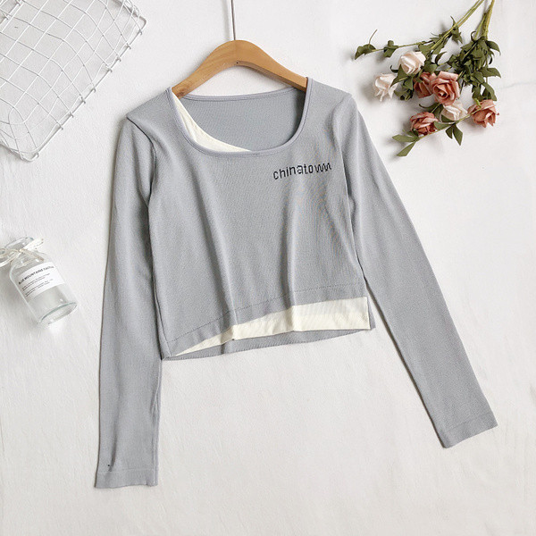 Ženska bluza s okruglim izrezom i vezom