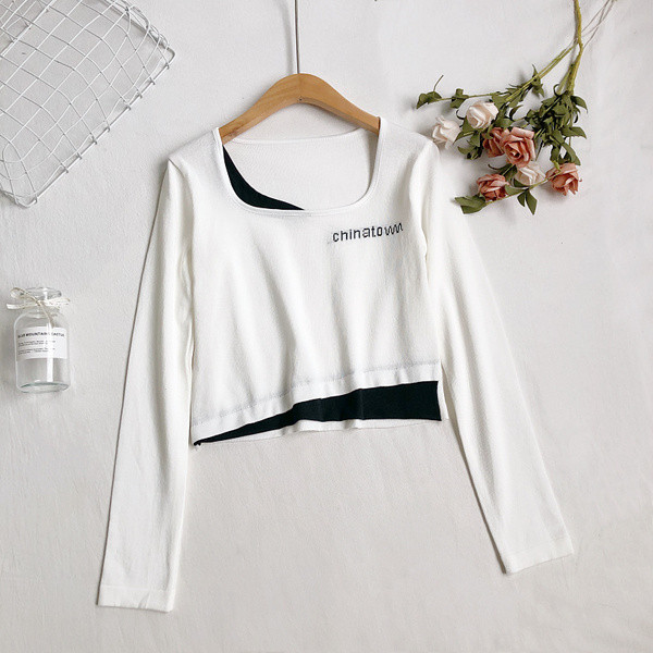 Ženska bluza s okruglim izrezom i vezom