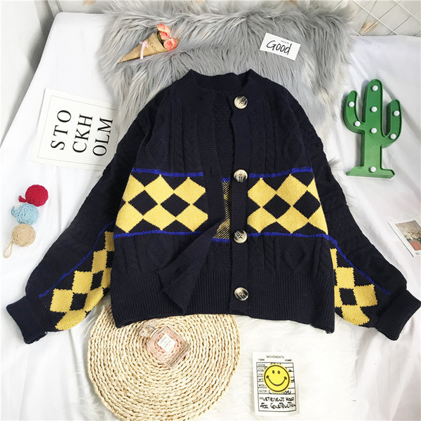 Γυναικεία ζακέτα  φθινοπώρου-χειμώνα με στρογγυλή λαιμόκοψη και μακριά μανίκια