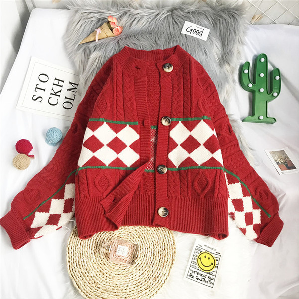 Γυναικεία ζακέτα  φθινοπώρου-χειμώνα με στρογγυλή λαιμόκοψη και μακριά μανίκια