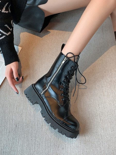 Tõmbluku ja kareda tallaga naiste saapad - musta värvi