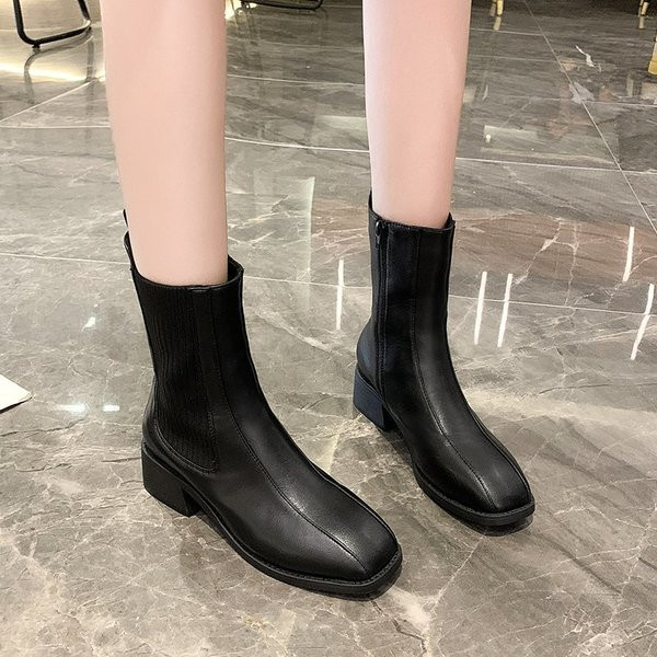 Musta värvi ökonahast lameda tallaga naiste saapad