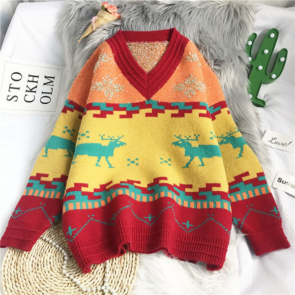 Γυναικείο λουλουδάτο πουλόβερ με φαρδιά λαιμόκοψη