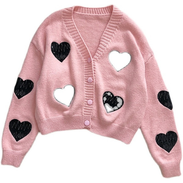 Modernus moteriškas megztinis platus modelis su sagomis