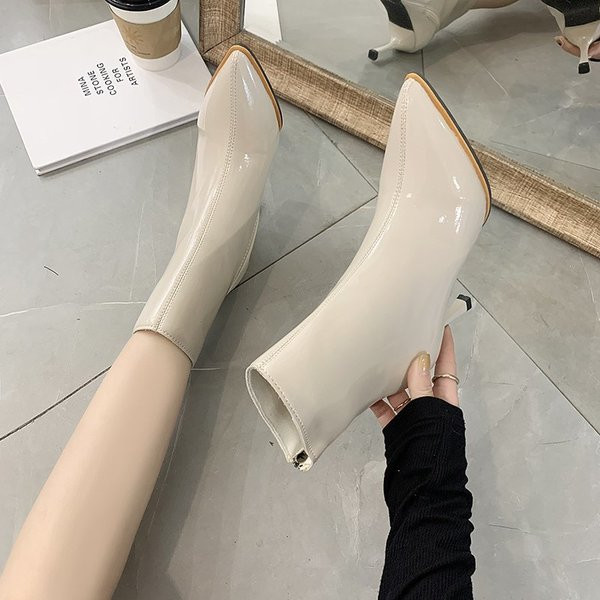 Tõmbluku ja õhukese kontsaga naiste saapad - valmistatud ökonahast