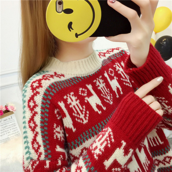 Naiste madala krae ja pikkade varrukatega kootud kampsun