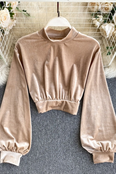 Moderna ženska baršunasta bluza s niskom polo kragnom