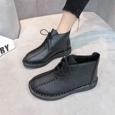 Γυναικείες μοντέρνες οικολογικές δερμάτινες μπότες με κορδόνια και επίπεδη σόλα