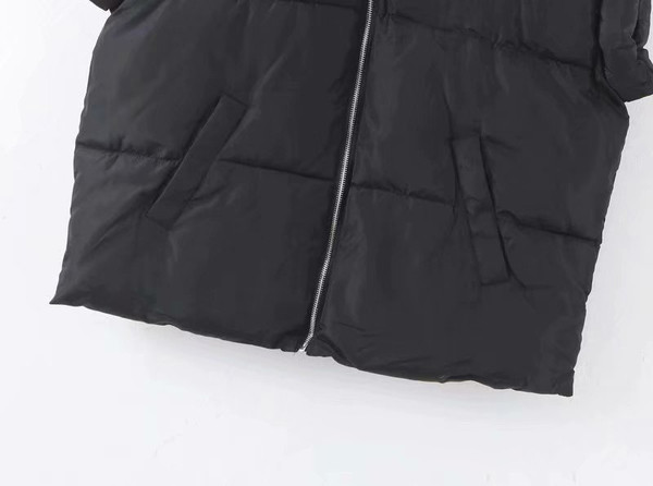 Kõrge krae ja lukuga sügis-talvine vest