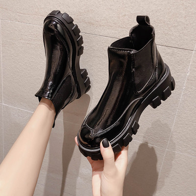 Musta ja valge krobelise tallaga naiste ökonahast saapad