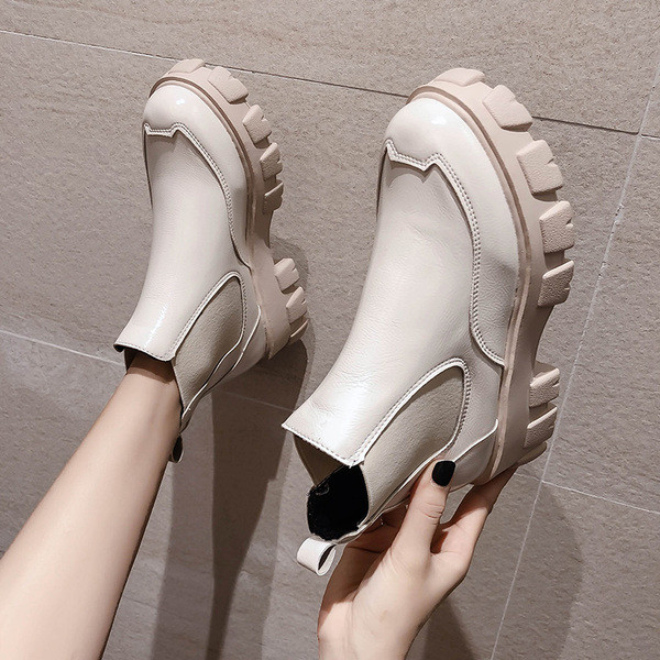 Musta ja valge krobelise tallaga naiste ökonahast saapad