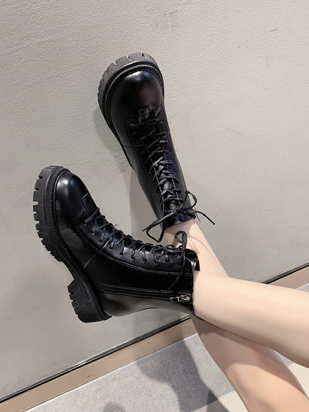 Naiste vabaaja saapad ökonahast paelte ja kareda tallaga