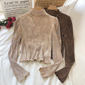 Μοντέρνα γυναικεία μπλούζα με ψηλό γιακά και μακριά μανίκια