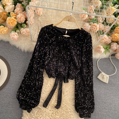 Stiilne litrite ja väljalõikega seljaosaga naiste särk