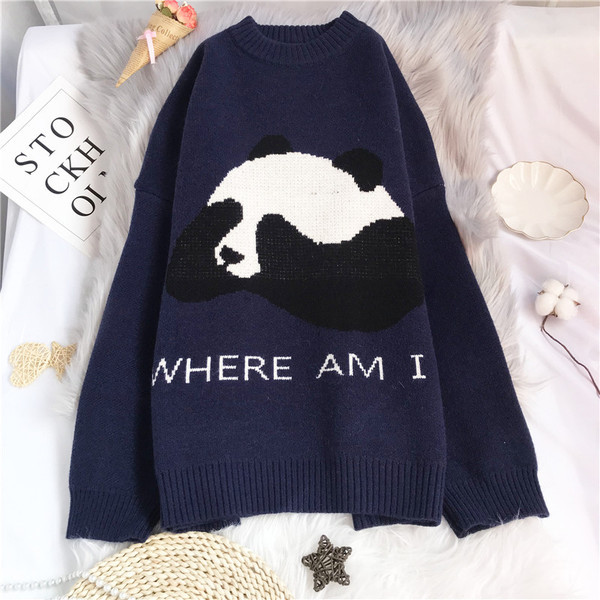 Plataus modelio moteriškas megztinis su ovalia iškirpte ir ilgomis rankovėmis