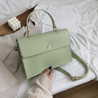 Κομψή γυναικεία έκο δερμάτινη τσάντα με κοντές και μεγάλες λαβές