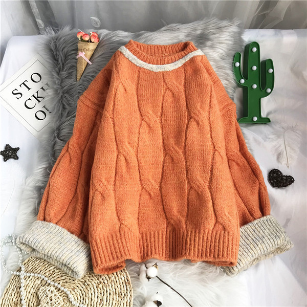 Πλεκτό γυναικείο πουλόβερ με στρογγυλή λαιμόκοψη και φαρδιά μανίκια