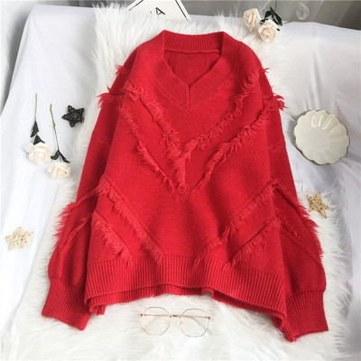 Γυναικείο πουλόβερ μεγάλου μεγέθους με λαιμόκοψη και κρόσσια