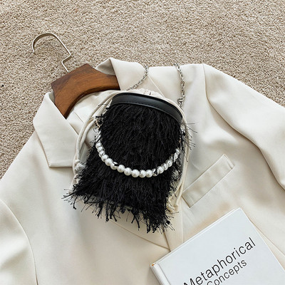 Novi model ženske torbe sa perlama i resicama