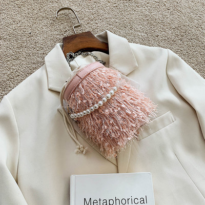 Novi model ženske torbe sa perlama i resicama