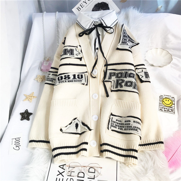 Uue mudeli naiste kampsun - spits-kaelusega ja nööpidega