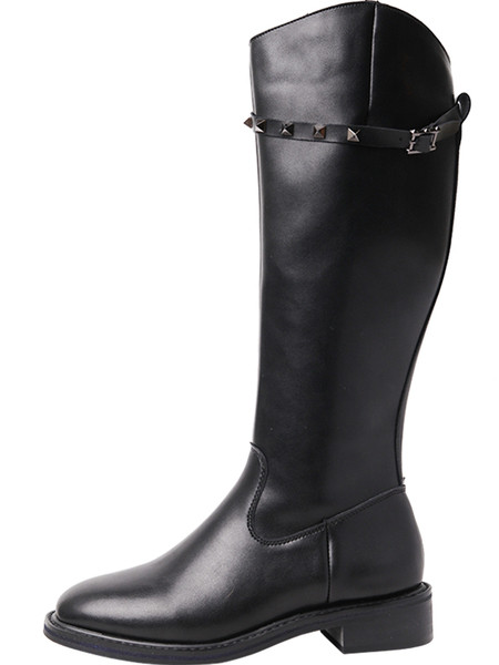 Öko-nahast metallist aasadega naiste saapad - musta värvi