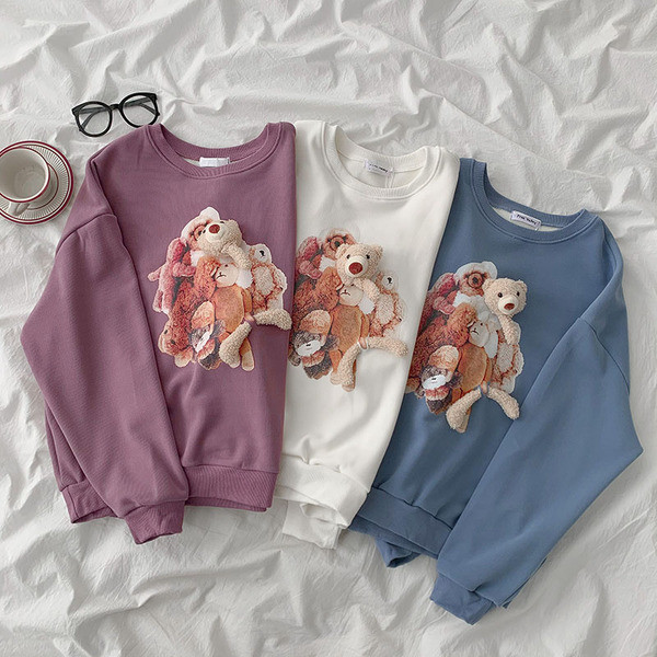 Naiste vabaaja pluus ümara kaelusega ja aplikatsiooniga