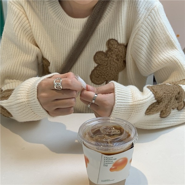 Aktualni ženski široki džemper sa vezom