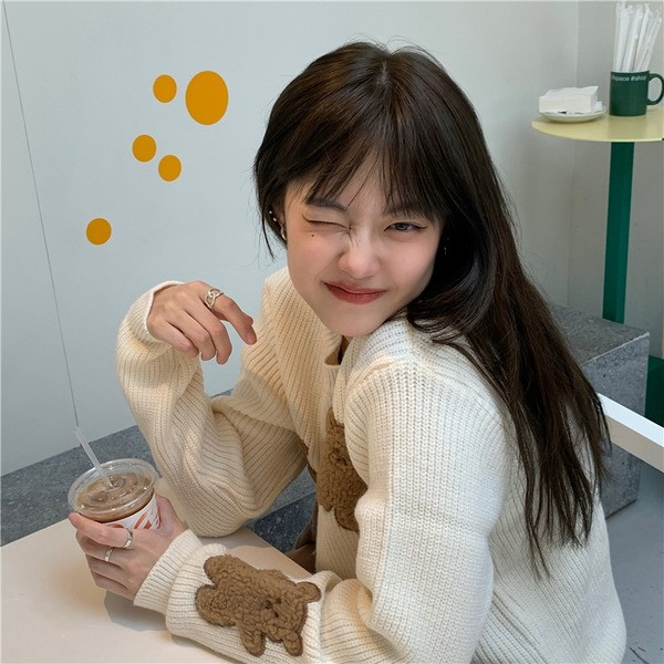 Aktualni ženski široki džemper sa vezom