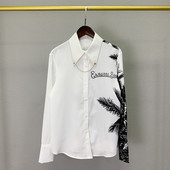 Stiilne varrukaaplikatsiooniga naiste särk