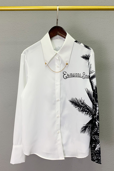 Stiilne varrukaaplikatsiooniga naiste särk