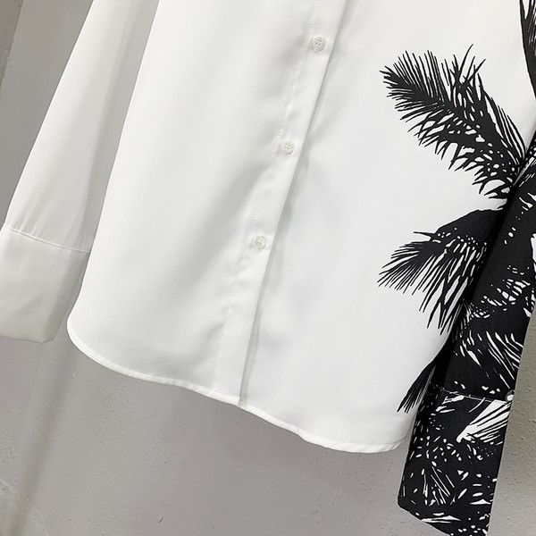 Stiilne varrukaaplikatsiooniga naiste särk