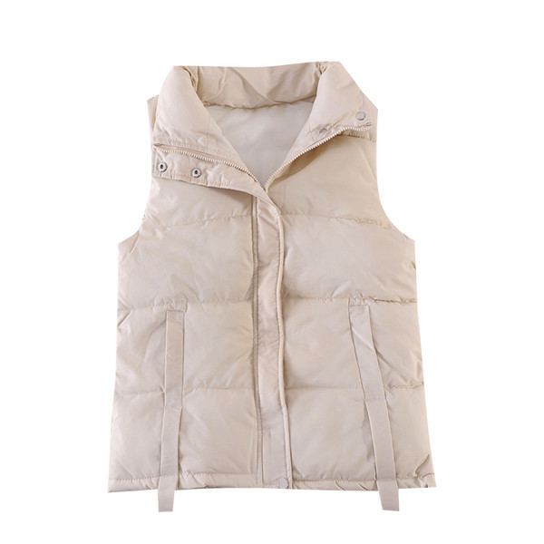 Kõrge krae ja taskutega sügisene naistevest