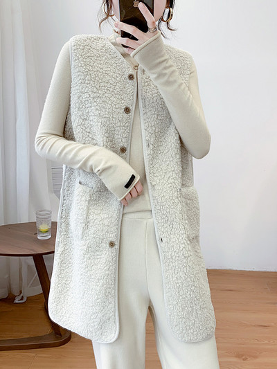 Naiste pikk nööpide ja taskutega sulevest