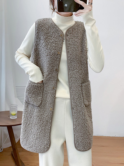 Naiste pikk nööpide ja taskutega sulevest